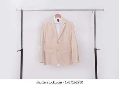 Business Formal Linen Suit With White Shirt On Hanger
