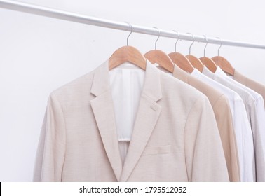 Business Formal Linen Suit  And White Shirt And Jacket On Hanger