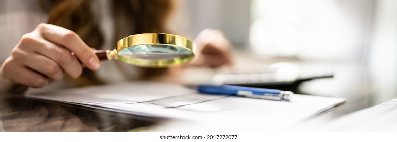 Business Fraud Investigation Using Magnifying Glass. Finance And Tax - Shutterstock ID 2017272077