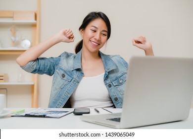 Business Freelance Woman Stretching Her Body Because Feel Tired After Working On Laptop, Smart Female Working At Home. Lifestyle Women Relax After Working At Home Concept.