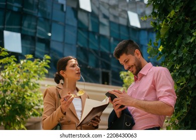 A Business Girl Is Getting Mad At Her Boyfriend Because He Is Not Paying Attention While She Is Talking To Him