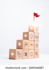 Business goal with growth success process for Leadership concept. Red flag on the top of wooden cube blocks as a stair step with up arrow sign strategy icon on white background, vertical style.
