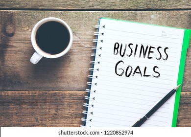 business goals text with coffee - Shutterstock ID 1220852974