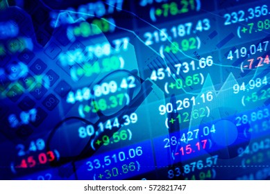 Business graph background: Analysis business accounting on info sheets. Businessman hand working on analyzing investment charts for Gold market, Forex market and Crude oil trading market. 