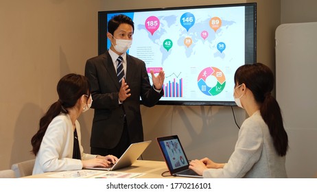 Business Group Meeting Wearing Mask