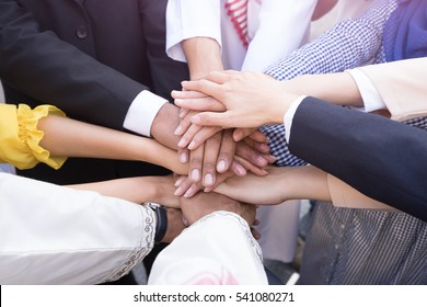 Business Groups People Hands Team, Stacked Huddle Together, Unity International. Successful And Teamwork With Hands Together Concept.