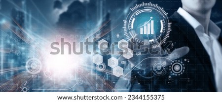 Business growth and development concept. Businessman pointing arrow graph growth, analyze big data and plan the business strategies for enhancing sales and revenues and profits performance. 