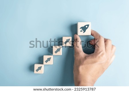 Business growth success achievement concept, hand of people arranging as step stair or ladder rocketship launch for planning development leadership and customer target group concept.