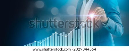 Business growth,boost up business or success concept.Businessman pointing arrow graph growth and financial network connection,analysing data to increase sales and revenue profit in global economic.