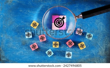 Business growth,success, innovation and teamwork concept, arranged  logs of wood,magnifier, target and arrow for planning development,leadership and customer business target