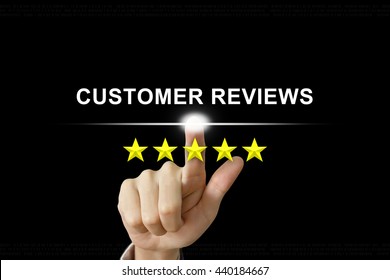 business hand clicking customer reviews with five stars on screen