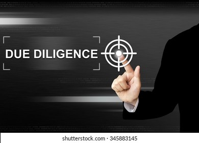 Business Hand Clicking Due Diligence Button On A Touch Screen Interface