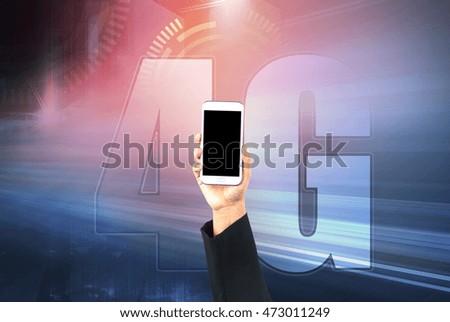 Business hand holding smart phone on technology background