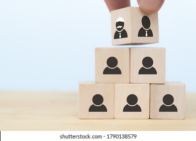Business Hand Man Put Arranging On Wooden Cube Block That Family Or Company Succession Business Concept From Old Generation To Next Generation.