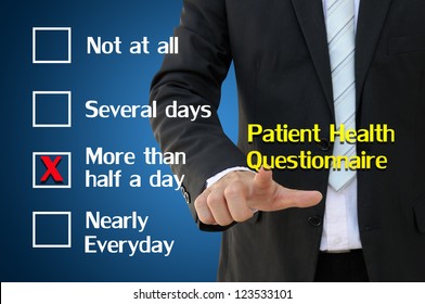 Business Hand Pointing Patient Health Questionnaire Concept