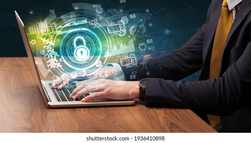 Business hand typing on a modern laptop - Shutterstock ID 1936410898