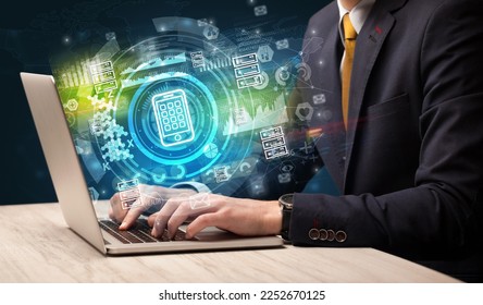 Business hand typing on a modern laptop - Shutterstock ID 2252670125