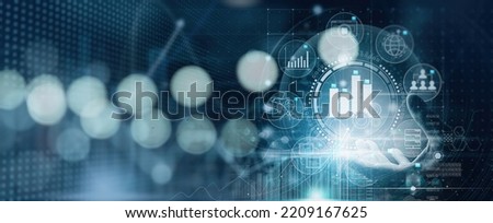 Business hand Worker holding Business analytics Big data analysis technology statistic future concept on VR screen on blur background.
