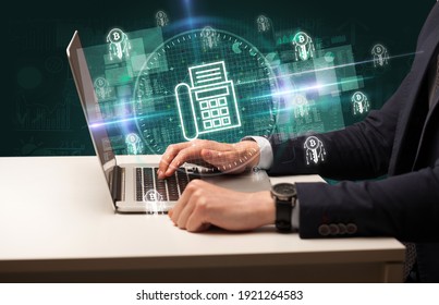 Business Hand Working In Stock Market With Fax Icons Coming Out From Laptop Screen