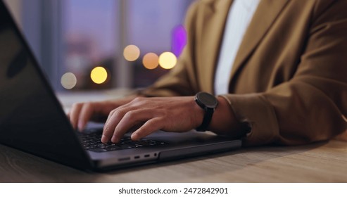 Business hands, typing and planning on laptop at night for research, copywriting and editing in bokeh lights. Writer, lifestyle journalist or editor with creative project or deadline for web article