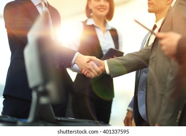 Business handshake - Shutterstock ID 401337595