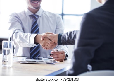 Business Handshake In The Office