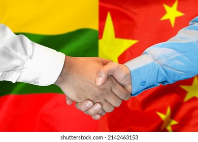 Business Handshake On The Background Of Two Flags. Men Handshake On The Background Of The Lithuania And China Flag. Support Concept