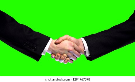 Business handshake on green screen background, partnership trust, respect sign - Powered by Shutterstock