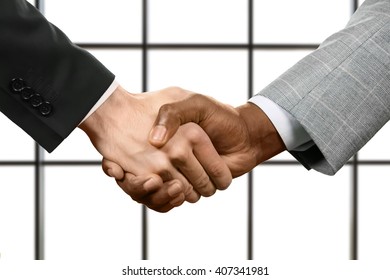 Business handshake on white background. Businessmen shaking hands. Remember your promises. Respect and approval. - Shutterstock ID 407341981