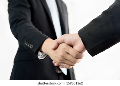 Business Handshake Over White Background