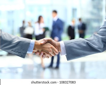 Business Handshake And Business People