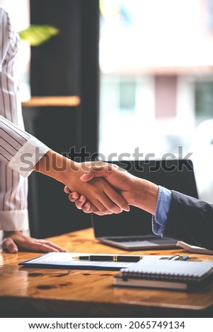 Business handshake picture agreeing to buy and sell real estate Venture International Investment contract, meeting, vision, investment for profit
