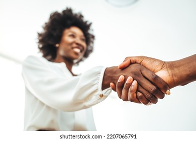 Business handshake for teamwork of business merger and acquisition,successful negotiate,hand shake,two businessman shake hand with partner to celebration partnership and business deal concept - Powered by Shutterstock