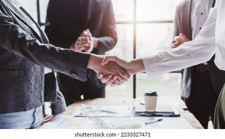 Business handshake for teamwork of business merger and acquisition,successful negotiate,hand shake,two businessman shake hand with partner to celebration partnership and business deal concept - Shutterstock ID 2233327471