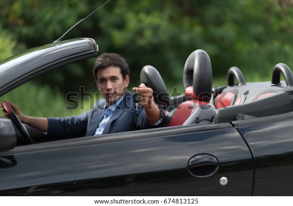 business\
handsome man in the car luxury life\
style.