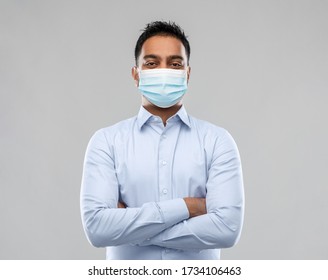 Business, Healthcare And People Concept - Indian Businessman In Shirt Wearing Face Medical Mask For Protection From Virus Disease Over Grey Background