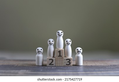 Business Hierarchy; Ranking And Strategy Concept With Wood Doll Standing On A Podium 1, 2, 3 Of Wooden Building Blocks With Copy Space.