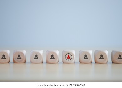 Business Hiring And Recruitment Selection. Career Opportunity. Human Resource Management. Find Terrorist. Focus Of Red Human Icon On Wooden Block. Choice Of Employee Leader Or New Employee From Crowd.