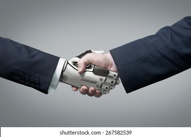 Business Human and Robot hands in handshake. Artificial intelligence technology Design Concept