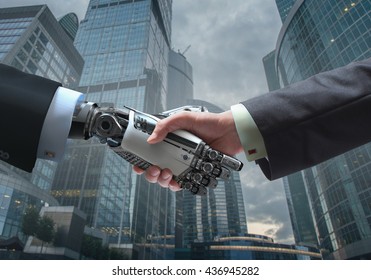 Business Human and Robot hands in handshake. Artificial intelligence technology Design Concept. Friendship between Artificial and real man conceptual template. - Powered by Shutterstock