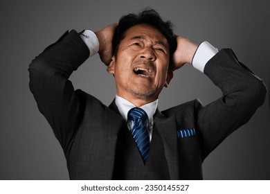 Business image of a troubled middle man - Powered by Shutterstock