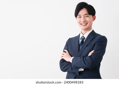 Business image of a young man wearing a business suit - Powered by Shutterstock