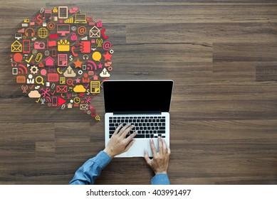 Business innovation technology set application icons, With businessman working on laptop computer PC on wood table, view from above - Shutterstock ID 403991497