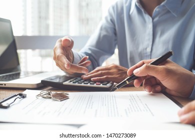 Business Insurance authorities showing an insurance policy and dealing the policyholder must to sign. - Shutterstock ID 1470273089