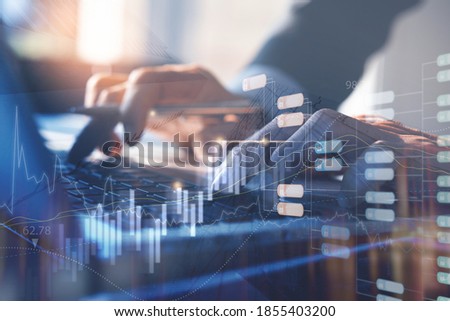Business intelligence, blockchain technology, big data concept. Business man working on laptop computer with financial graph, monitoring on stock market report and encrypted blocks on virtual screen Foto stock © 