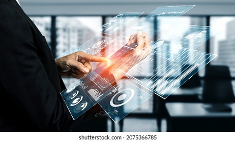 Business intelligence technology and big data analytic mixed media showing concept of futuristic information report using computer software to analyze strategic investment advice for decision making . - Shutterstock ID 2075366785