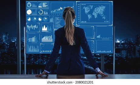 Business intelligence technology and big data analytic mixed media showing concept of futuristic information report using computer software to analyze strategic investment advice for decision making . - Shutterstock ID 2080021201