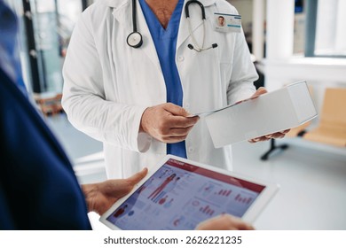 Business interaction between pharma rep and healthcare provider.