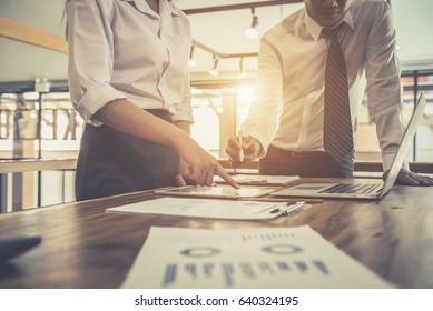 Business Investment Consultant Team Analyzing Company Annual Financial Report Balance Sheet Statement Working With Documents Graphs. Stock Market, Office, Tax, Education Concept.