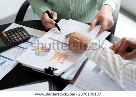 Business investor analyzing a valuation data forecast a investment project.
